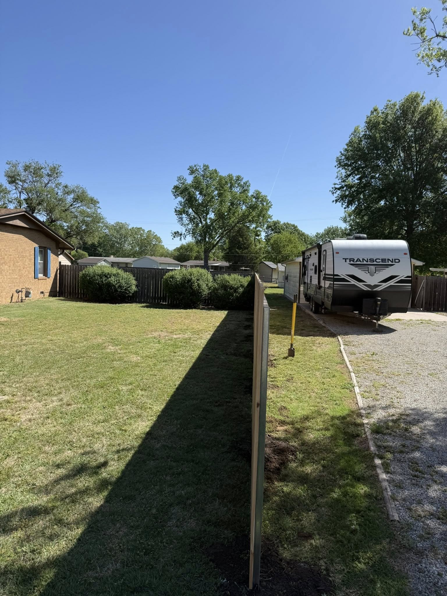 Crew installing fence