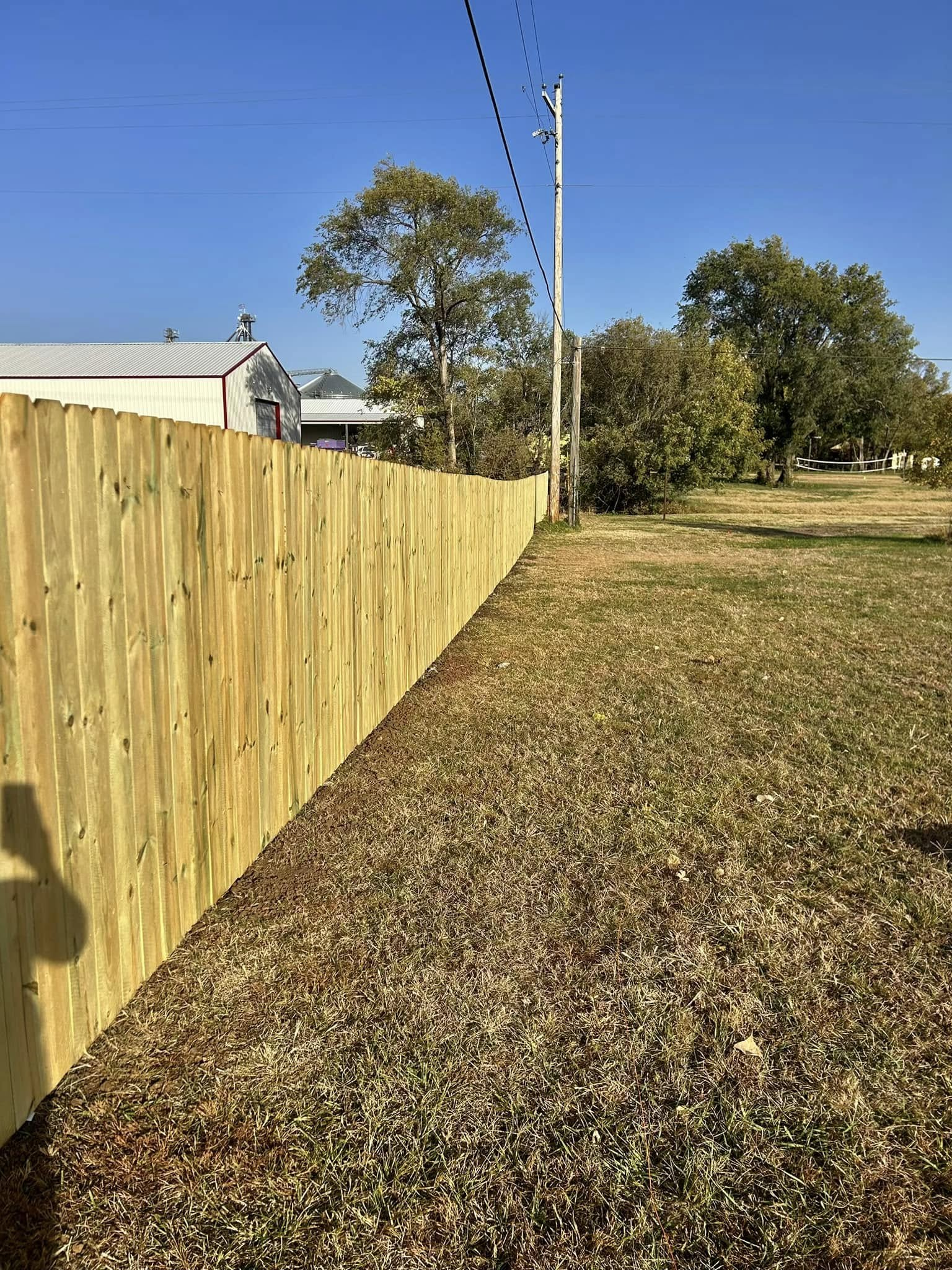 Cedar fence on open rural property