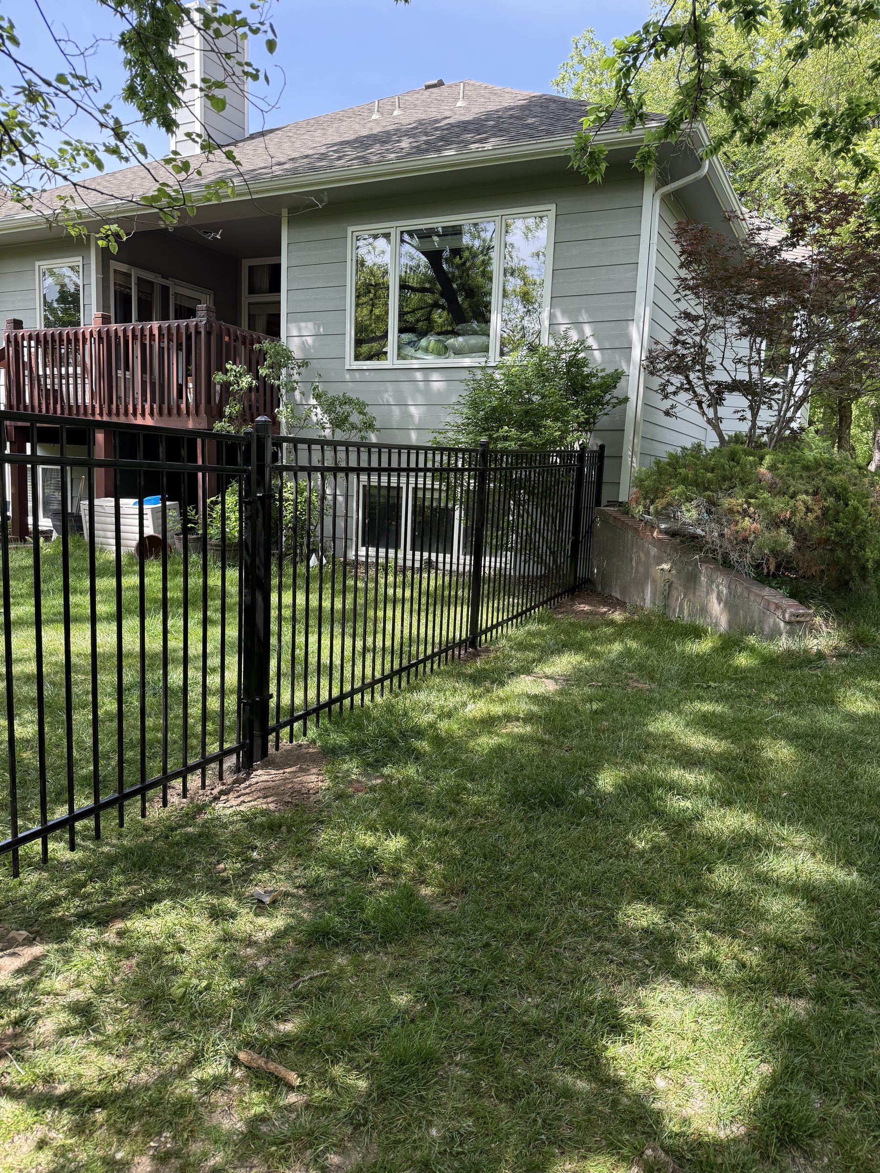 Fence installation with freshly set posts